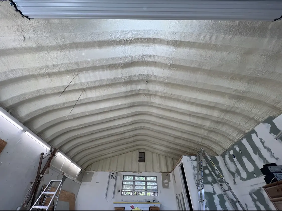 Spray polyurethane foam applied to the underside of a metal roof deck in Windsor Locks